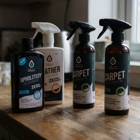 High-quality upholstery and carpet cleaning products with spray triggers, designed for effective dirt and stain removal from various surfaces.
